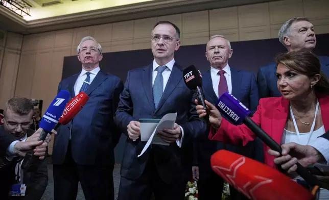 Russian presidential aide Vladimir Medinsky, second left, arrives for a news conference following a meeting between Russian and Ukrainian delegations for peace talks at Ciragan palace, in Istanbul, Turkey, Wednesday, July 23, 2025. (AP Photo/Emrah Gurel)