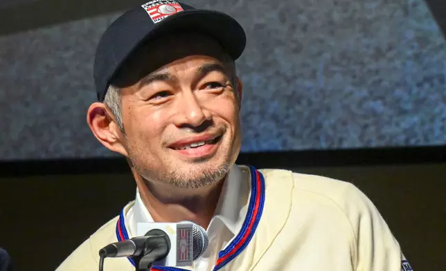 FILE - Newly elected Baseball Hall of Fame inductee Ichiro Suzuki talks to reporters during a news conference Thursday, Jan. 23, 2025, in Cooperstown, N.Y. (AP Photo/Hans Pennink, File)