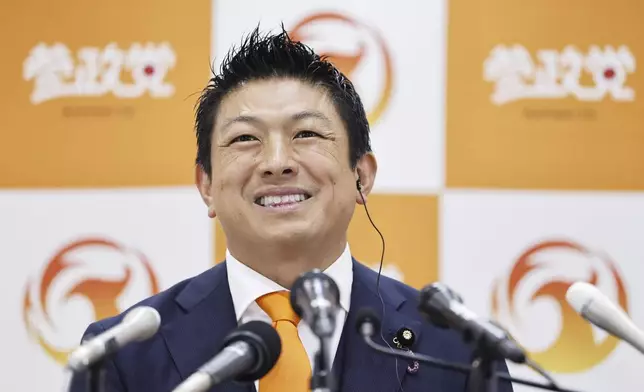 Sohei Kamiya, leader of Sanseito party speaks to the media following the upper house election in Tokyo, Sunday, July 20, 2025. (Kyodo News via AP)