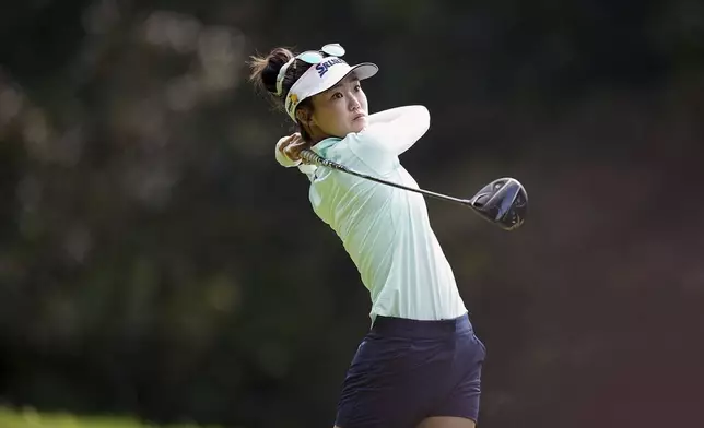 Grace Kim, of Australia, plays on the 4th hole during the last round of the Evian Championship women's golf tournament, in Evian, eastern France, Sunday, July 13, 2025. (AP Photo/Laurent Cipriani)
