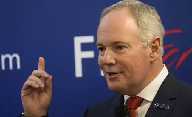 Tim Mayer, the son of former McLaren team principal Teddy Mayer addresses the media after announcing that he is running for the presidency of motorsport's governing body the FIA in December's election, in Whittlebury Park, England, Friday, July 4, 2025. (AP Photo/Darko Bandic)