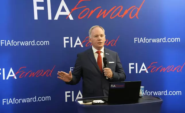Tim Mayer, the son of former McLaren team principal Teddy Mayer addresses the media after announcing that he is running for the presidency of motorsport's governing body the FIA in December's election, in Whittlebury Park, England, Friday, July 4, 2025. (AP Photo/Darko Bandic)