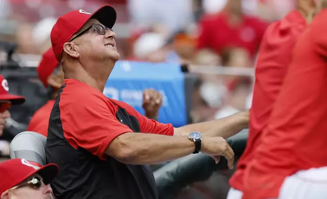 Cincinnati Reds manager Terry Francona watches a fly ball against the Colorado Rockies during the third inning of a baseball game, Sunday, July 13, 2025, in Cincinnati. (AP Photo/Jay LaPrete)
