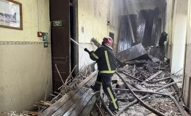 In this photo provided by the Ukrainian Emergency Service, firefighters put out the fire in a fire department school following a Russian air attack in Kropyvnytskyi, Ukraine, Monday, July 28, 2025. (Ukrainian Emergency Service via AP)
