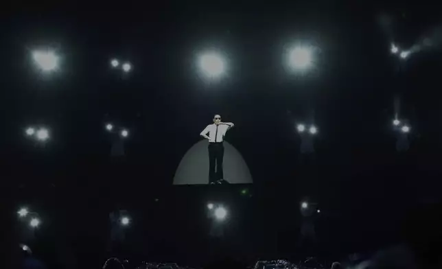 South Korean singer PSY performs during his concert "Summer Swag 2025" at the Incheon Asiad Main Stadium in Incheon, South Korea, Saturday, June 28, 2025. (AP Photo/Ahn Young-joon)