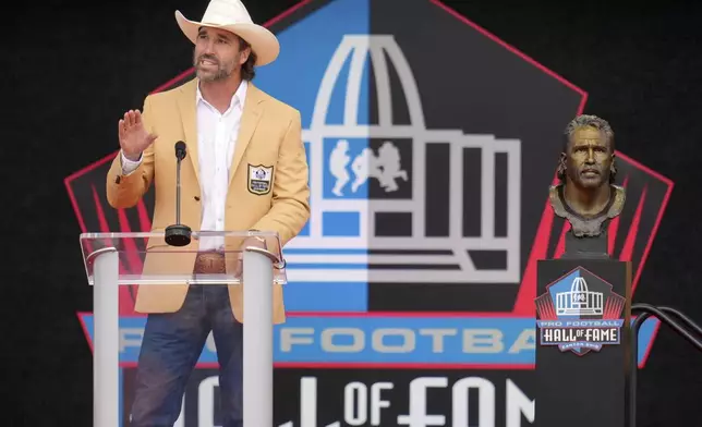 Former NFL player Jared Allen speaks during his induction into the Pro Football Hall of Fame, Saturday, Aug. 2, 2025, in Canton, Ohio. (AP Photo/Sue Ogrocki)