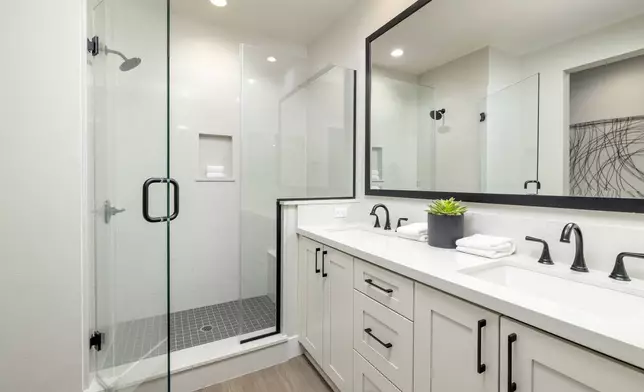 The spa-inspired primary suites offer abundant storage and dual walk-in closets, while secondary bedrooms include en-suite baths.