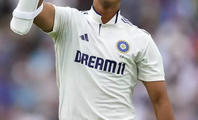 India's Yashasvi Jaiswal celebrates after scoring a century during the third day of the fifth cricket test match between England and India at The Kia Oval in London, Saturday, Aug. 2, 2025. (AP Photo/Kirsty Wigglesworth)