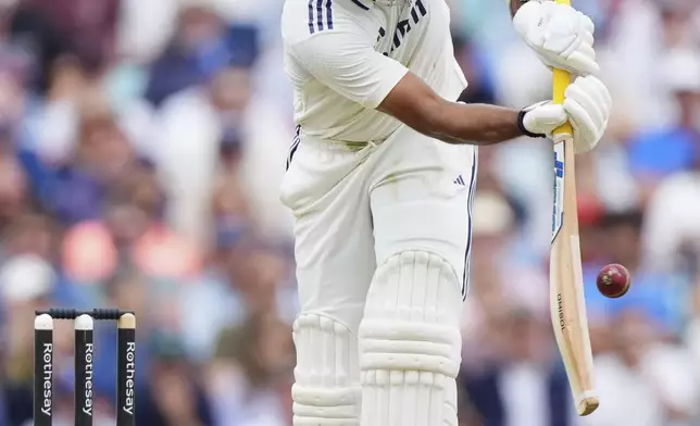 India's Akash Deep plays a shot during the third day of the fifth cricket test match between England and India at The Kia Oval in London, Saturday, Aug. 2, 2025. (AP Photo/Kirsty Wigglesworth)
