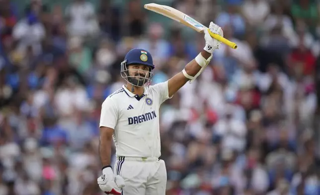 India's Akash Deep celebrates after scoring fifty runs during the third day of the fifth cricket test match between England and India at The Kia Oval in London, Saturday, Aug. 2, 2025. (AP Photo/Kirsty Wigglesworth)