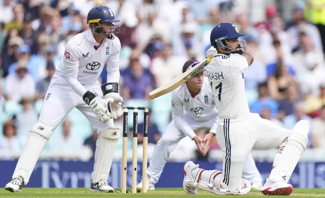 India's Akash Deep plays a shot during the third day of the fifth cricket test match between England and India at The Kia Oval in London, Saturday, Aug. 2, 2025. (AP Photo/Kirsty Wigglesworth)