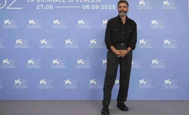 Oscar Isaac poses for photographers at the photo call for the film 'Frankenstein' during the 82nd edition of the Venice Film Festival in Venice, Italy, on Saturday, Aug. 30, 2025. (Photo by Alessandra Tarantino/Invision/AP)