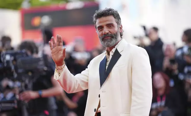 Oscar Isaac poses for photographers at the red carpet for the film 'Frankenstein' during the 82nd edition of the Venice Film Festival in Venice, Italy, on Saturday, Aug. 30, 2025. (Photo by Scott A Garfitt/Invision/AP)