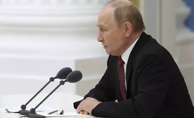 Russian President Vladimir Putin speaks during a working meeting to discuss the results of the Russia-US summit in Alaska at the Kremlin in Moscow, Russia, on Saturday, Aug. 16, 2025. (Vyacheslav Prokofyev, Sputnik, Kremlin Pool Photo via AP)