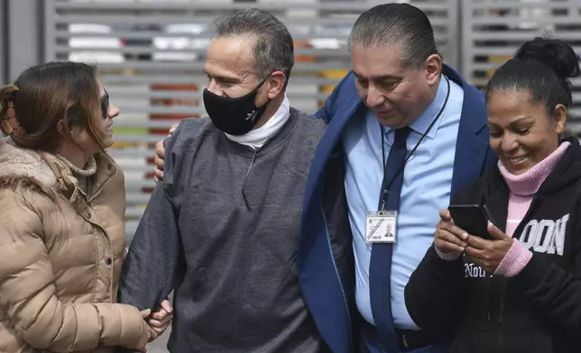 Israel Vallarta, second from left, leaves Altiplano maximum security prison after a judge ordered his release in Almoloya, near Mexico City, Friday, Aug. 1, 2025. Vallarta served almost 20 years behind bars for being the leader of a kidnapping ring before a judge ruled on Thursday that the evidence didn't support the charges against him. (AP Photo/Haaron Alvarez)