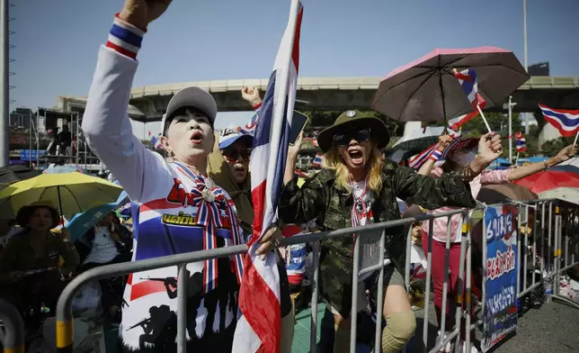 Protesters gather at Victory Monument demanding Thailand's Prime Minister Paetongtarn Shinawatra resign in Bangkok, Thailand, Saturday, Saturday, Aug. 2, 2025. (AP Photo/Tadchakorn Kitchaiphon)