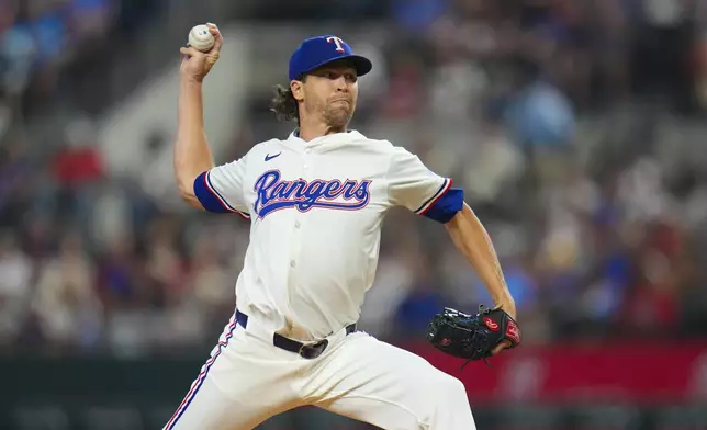 Texas Rangers starting pitcher Jacob deGrom throws to the Philadelphia Phillies during the first inning of a baseball game Saturday, Aug. 9, 2025, in Arlington, Texas. (AP Photo/Julio Cortez)