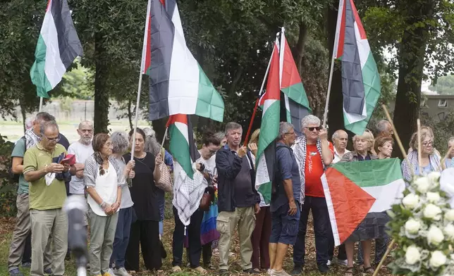 Mourners attend the funeral of 19-year-old Palestinian woman Marah Abu Zhuri in Pontesserchio, near Pisa, Italy, Wednesday Aug. 20, 2025, who died there after being evacuated from Gaza. (Alessandro La Rocca/LaPresse via AP)