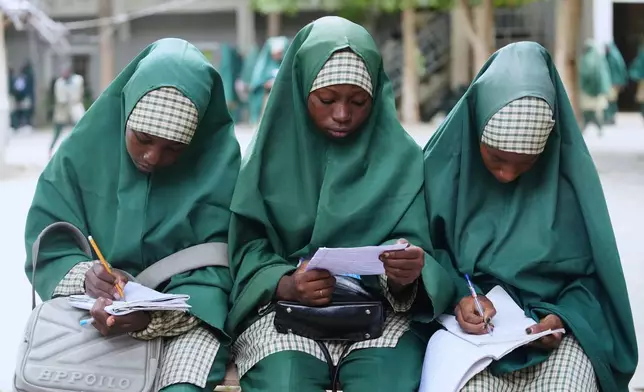 Students of the Future Prowess Islamic Foundation School study for there exams in Maiduguri, Nigeria, Thursday, July 24, 2025. (AP Photo/Sunday Alamba)