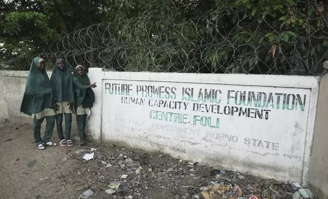 Students of the Future Prowess Islamic Foundation School pose for a photo, in Maiduguri, Nigeria, Thursday, July 24, 2025. (AP Photo/Sunday Alamba)