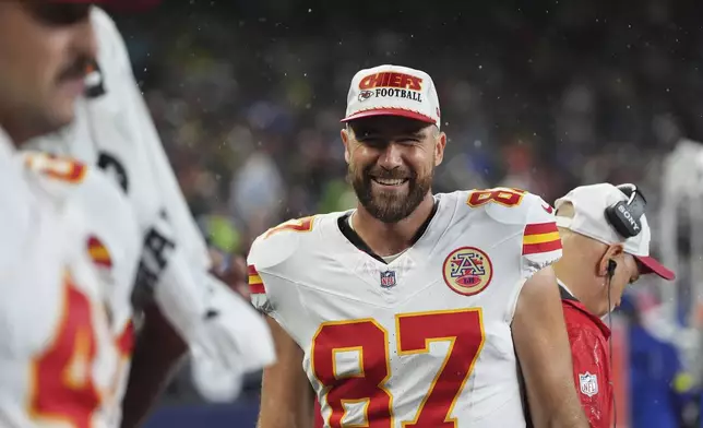 Kansas City Chiefs tight end Travis Kelce (87) reacts on the sideline during the second half of an NFL preseason football game against the Seattle Seahawks, Friday, Aug. 15, 2025, in Seattle. (AP Photo/Lindsey Wasson)