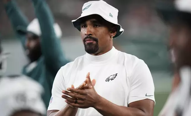 Philadelphia Eagles quarterback Jalen Hurts watches from the sideline in the second half of a preseason NFL football game against the New York Jets in East Rutherford, N.J., Friday, Aug. 22, 2025. (AP Photo/Frank Franklin)