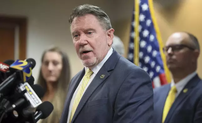 Chris Hosey, Director of Georgia Bureau of Investigation, speaks about the details of the shooting near the CDC and Emory University at the GBI headquarters, Tuesday, Aug., 12, 2025, in Decatur, Ga. (Jason Getz/Atlanta Journal-Constitution via AP)