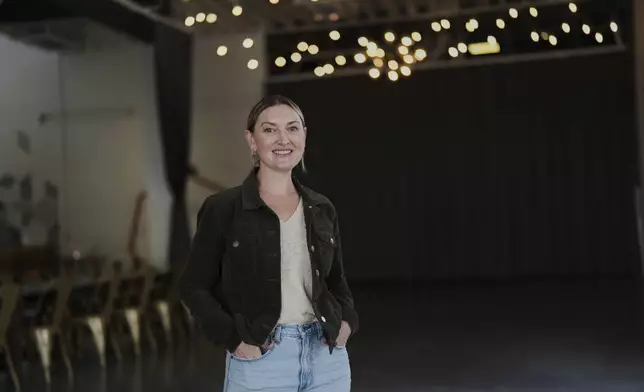 Christina Elsass, co-owner and venue manager of Mojave East, poses for a portrait Monday, Aug. 4, 2025, in Newtown, Ohio. (AP Photo/Joshua A. Bickel)