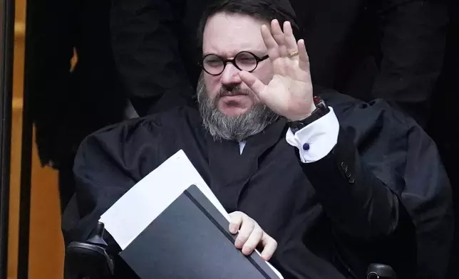 FILE- Nicholas Rossi leaves Edinburgh Sheriff and Justice of the Peace Court during his extradition hearing in Edinburgh, Scotland, June 30, 2023. (Andrew Milligan/PA via AP, File)