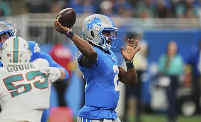 Detroit Lions quarterback Hendon Hooker (2) passes during the second half of an NFL preseason football game against the Miami Dolphins Saturday, Aug. 16, 2025, in Detroit. (AP Photo/Paul Sancya)