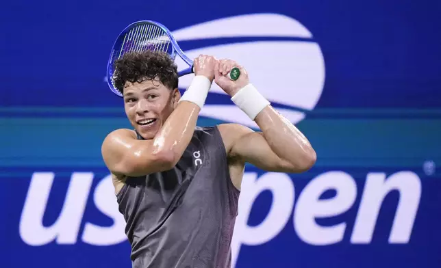 Ben Shelton returns a shot to Pablo Carreno Busta, of Spain, during the second round of the U.S. Open tennis championships, Wednesday, Aug. 27, 2025, in New York. (AP Photo/Frank Franklin II)