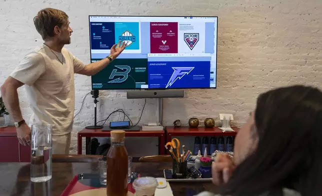 Flower Shop's co-founder and Chief Creative Officer Alastair Merry presents the sketches of team logos for Professional Women's Hockey League, Thursday, July 30, 2025, in New York. (AP Photo/Yuki Iwamura)