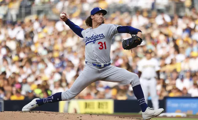 Los Angeles Dodgers starting pitcher Tyler Glasnow works against the San Diego Padres in the first inning of a baseball game Saturday, Aug. 23, 2025, in San Diego. (AP Photo/Derrick Tuskan)