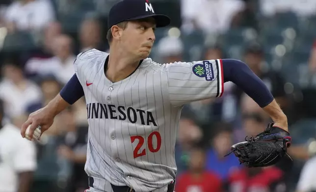 Minnesota Twins pitcher Mick Abel throws the ball against the Chicago White Sox during the first inning of a baseball game Saturday, Aug. 23, 2025, in Chicago. (AP Photo/David Banks)