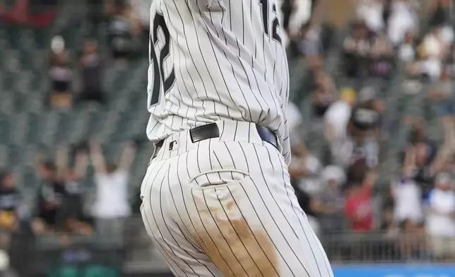 Chicago White Sox's Colson Montgomery gestures after hitting a grand slam against the Minnesota Twins during the second inning of a baseball game Saturday, August 23, 2025, in Chicago. (AP Photo/David Banks)