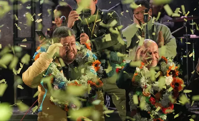 Presidential candidate Samuel Doria Medina, left, and running mate Jose Luis Lupo attend their closing campaign rally in El Alto, Bolivia, Wednesday, Aug. 13, 2025. (AP Photo/Juan Karita)