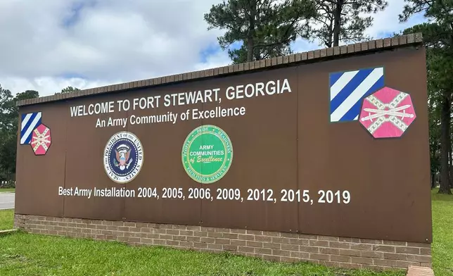 A sign outside the main gate of Fort Stewart, Georgia, is shown on Wednesday, Aug. 6, 2025. (AP Photo/Russ Bynum)