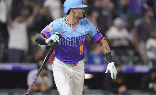 Colorado Rockies' Brenton Doyle heads up the first-base line after hitting a two-run, walkoff home run off Pittsburgh Pirates relief pitcher Dennis Santana in the ninth inning of a baseball game Friday, Aug. 1, 2025, in Denver. (AP Photo/David Zalubowski)