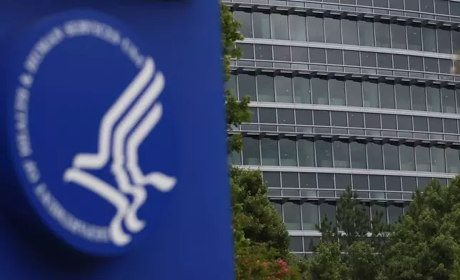 The notable bullet marks on the windows of the Centers for Disease Control and Prevention headquarters are visible from Clifton Rd, on Sunday, Aug. 10, 2025. (Miguel Martinez/Atlanta Journal-Constitution via AP)