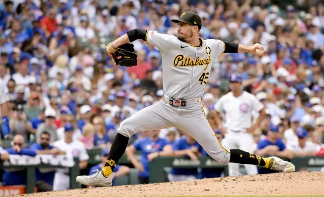 Pittsburgh Pirates pitcher Andrew Heaney throws against the Chicago Cubs during the fifth inning of a baseball game, Sunday, Aug. 17, 2025, at Wrigley Field in Chicago. (AP Photo/Mark Black)