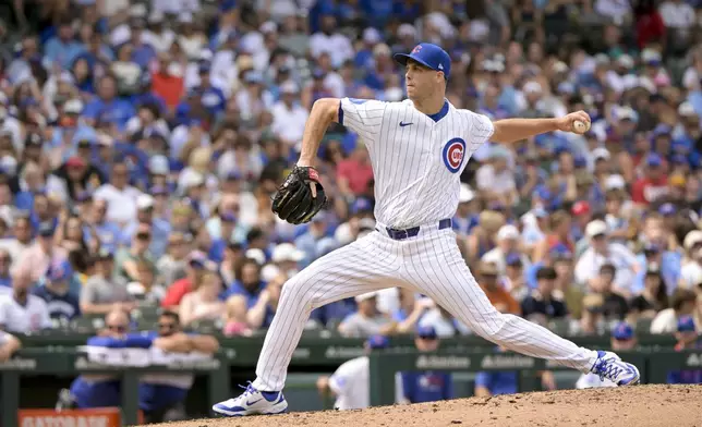 Chicago Cubs pitcher Taylor Rogers throws against the Pittsburgh Pirates during the fifth inning of a baseball game, Sunday, Aug. 17, 2025, at Wrigley Field in Chicago. (AP Photo/Mark Black)