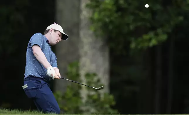 Robert MacIntyre, of Scotland, chips onto the second green during the final round of the BMW Championship golf tournament Sunday, Aug. 17, 2025, in Owings Mills, Md. (AP Photo/Stephanie Scarbrough)