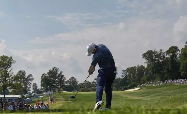 Robert MacIntyre, of Scotland, hits off the ninth tee during the final round of the BMW Championship golf tournament Sunday, Aug. 17, 2025, in Owings Mills, Md. (AP Photo/Stephanie Scarbrough)