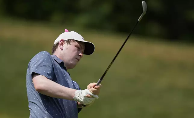 Robert MacIntyre, of Scotland, hits on the first hole during the final round of the BMW Championship golf tournament Sunday, Aug. 17, 2025, in Owings Mills, Md. (AP Photo/Stephanie Scarbrough)