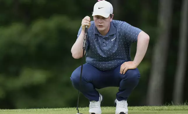 Robert MacIntyre, of Scotland, prepares to putt on the second hole during the final round of the BMW Championship golf tournament Sunday, Aug. 17, 2025, in Owings Mills, Md. (AP Photo/Stephanie Scarbrough)