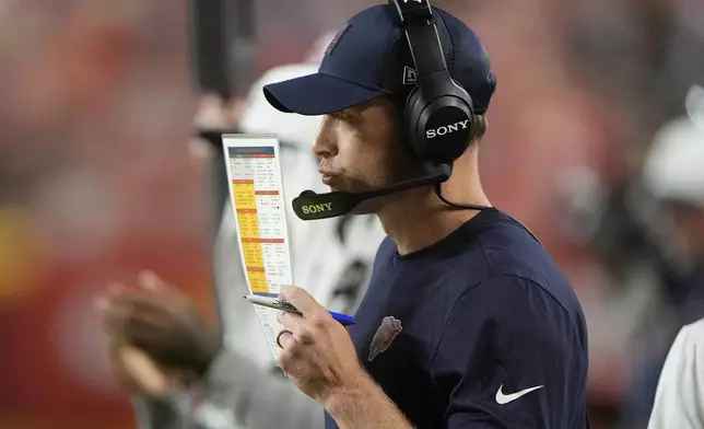 Chicago Bears head coach Ben Johnson watches from the sidelines during the second half of a preseason NFL football game against the Kansas City Chiefs Friday, Aug. 22, 2025, in Kansas City, Mo. (AP Photo/Charlie Riedel)