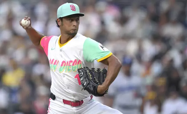 San Diego Padres starting pitcher Yu Darvish works against a Los Angeles Dodgers batter during the first inning of a baseball game Friday, Aug. 22, 2025, in San Diego. (AP Photo/Orlando Ramirez)