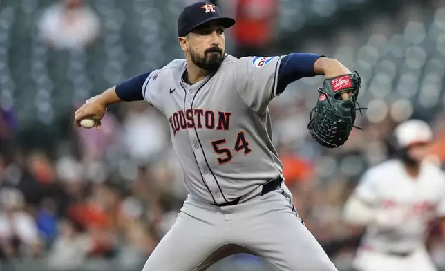 Houston Astros starting pitcher Jason Alexander delivers during the first inning of a baseball game against the Baltimore Orioles, Thursday, Aug. 21, 2025, in Baltimore. (AP Photo/Stephanie Scarbrough)