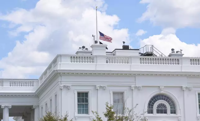 The flags have been lowered to half-staff on the North Lawn of the White House, Wednesday, Aug. 27, 2025, in Washington, in response to deaths in a school shooting in Minneapolis, according to the White House. (AP Photo/Jacquelyn Martin)