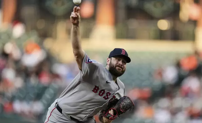Boston Red Sox starting pitcher Lucas Giolito delivers during the second inning of a baseball game against the Baltimore Orioles, Tuesday, Aug. 26, 2025, in Baltimore. (AP Photo/Stephanie Scarbrough)
